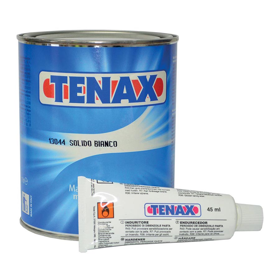 Tenax paste wax can and tube on a white background